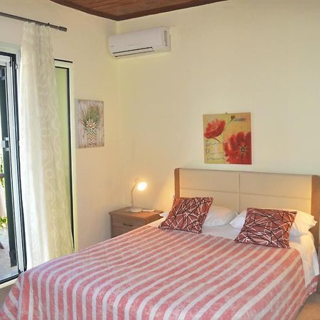 Beachfront Vacation Home Eftichia Agios Gordios  Exterior photo